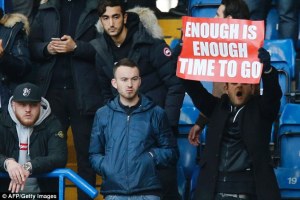 fans-raise-banner-during-their-defeat-at-stanford-bridge